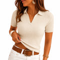Polo femme taille M en maille côtelée écrue à manches courtes
